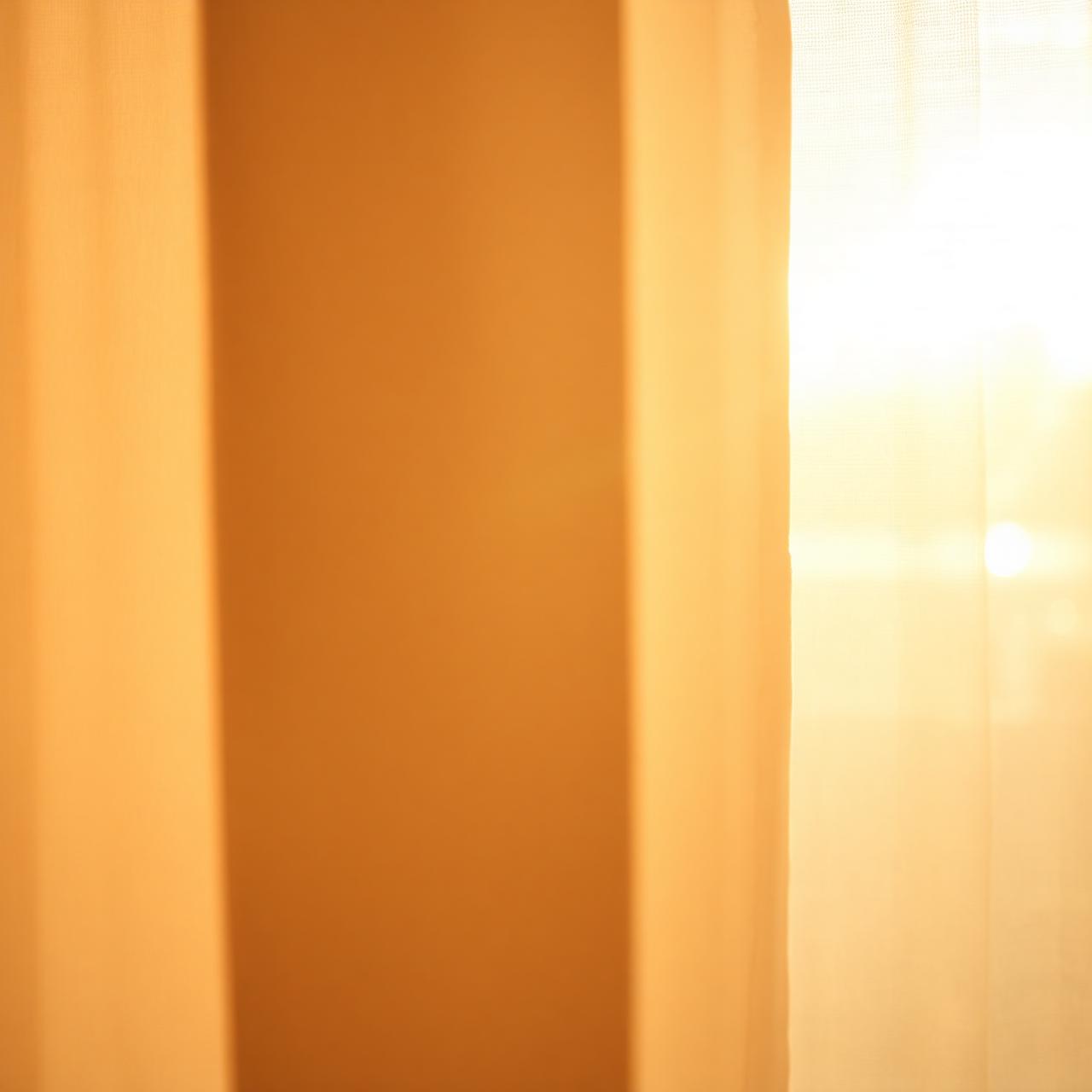 Warm sunlight filtering through linen curtains